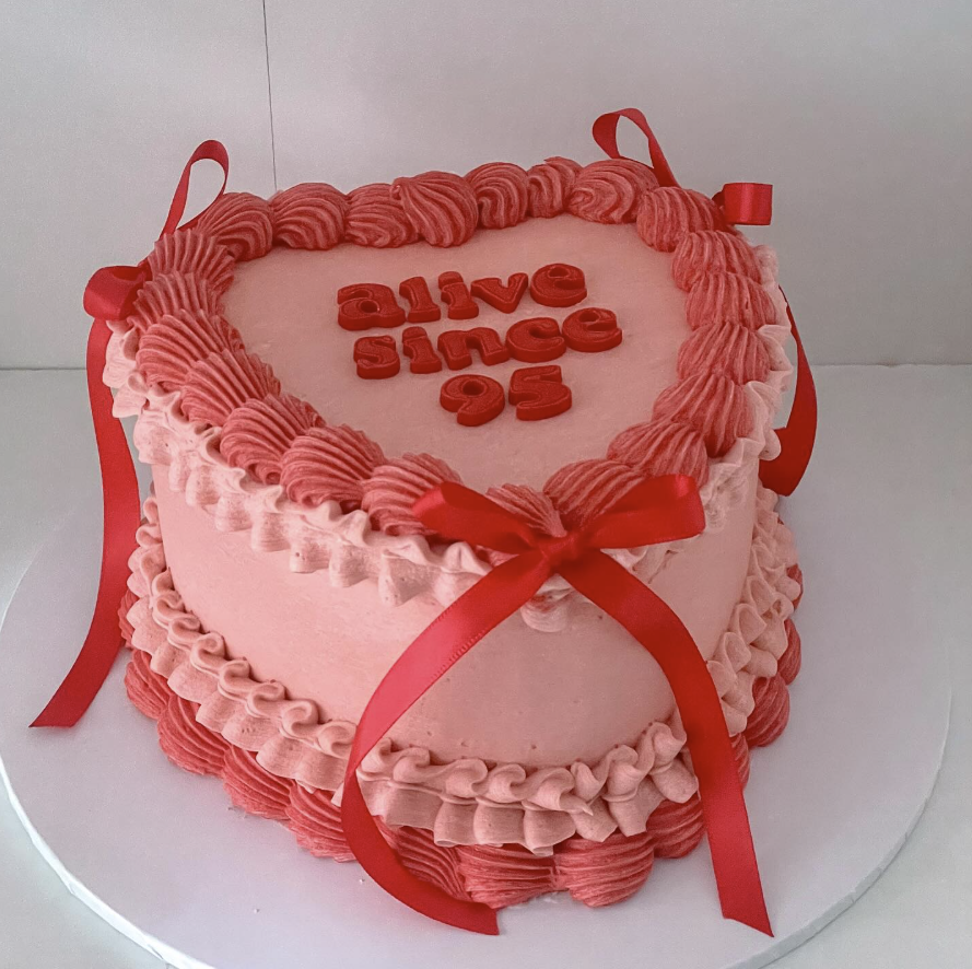 Pink 'alive since 95' vintage heart cake with red ribbon, Adelaide, Honey Love Cakes